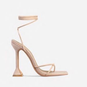 Tan lace up heels from Ego shoes.